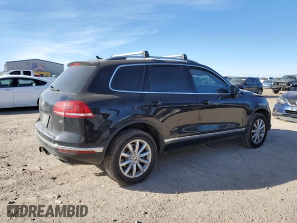 2016 Volkswagen Touareg Sport with VIN WVGEF9BP9GD010964, listed as a Copart auction lot 85800844 with 157,563 mi miles and Salvage Title. Bid and sale history available at DreamBid. Image 3.