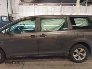 2015 Toyota Sienna L with VIN 5TDZK3DCXFS567507, listed as a IAAI auction lot 41205670 with 104,443 mi miles and . Bid and sale history available at DreamBid. Image 15.