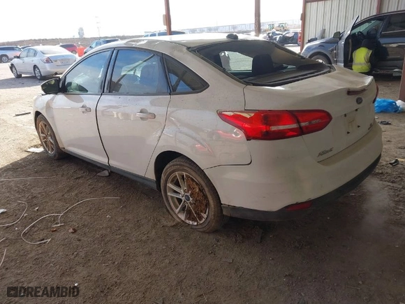 2016 Ford Focus SE with VIN 1FADP3F21GL302113, listed as a IAAI auction lot 41560346 with 169,430 mi miles. Bid and sale history available at carsss.com. Image 3.
