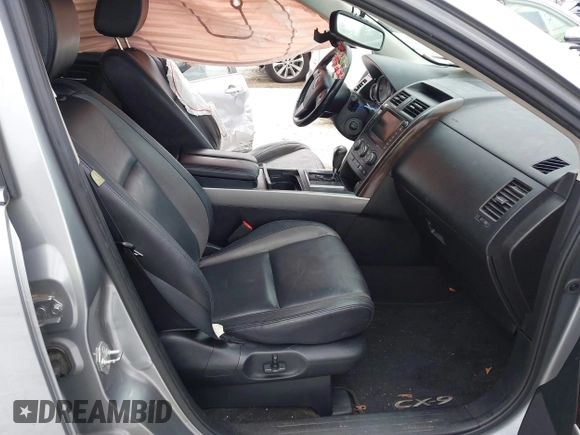 2012 Mazda CX-9 Grand Touring with VIN JM3TB3DV2C0353558, listed as a IAAI auction lot 41397266 with 158,843 mi miles and . Bid and sale history available at DreamBid. Image 5.