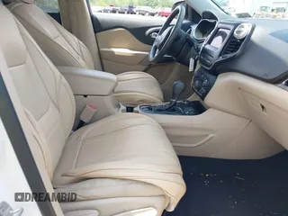 2020 Jeep Cherokee Latitude with VIN 1C4PJMCBXLD651472, listed as a IAAI auction lot 42590047 with 68,947 mi miles and . Bid and sale history available at DreamBid. Image 5.