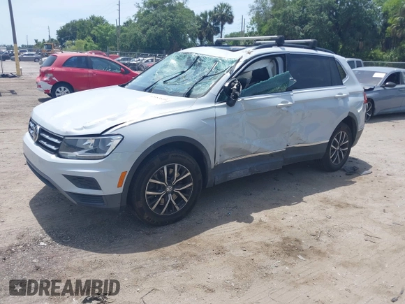 2018 Volkswagen Tiguan SEL with VIN 3VV3B7AX4JM201878, listed as a IAAI auction lot 42083809 with 115,956 mi miles and . Bid and sale history available at DreamBid. Image 2.