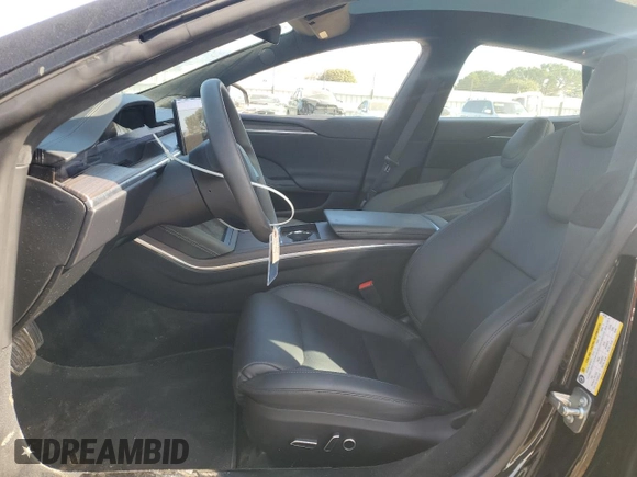2023 Tesla Model S with VIN 5YJSA1E57PF507456, listed as a Copart auction lot 44649945 with 8,760 mi miles and Salvage title. Bid and sale history available at DreamBid. Image 7.