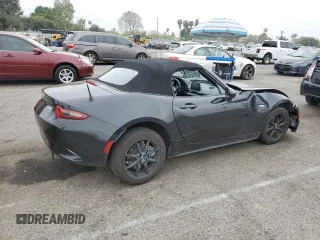 2021 Mazda MX-5 Miata Sport with VIN JM1NDAB70M0455950, listed as a Copart auction lot 54979915 with Not provided miles and Salvage title. Bid and sale history available at DreamBid. Image 3.