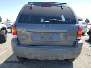 2005 Ford Escape XLT z VIN 1FMYU03155KB11291, wystawiony jako Copart lot #52246495 z przebiegiem Nie podano mil oraz Szkoda całkowita • Salvage title. Historia ofert i sprzedaży dostępna na DreamBid. Obrazek 6.