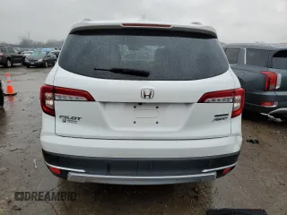 2021 Honda Pilot Touring 7-Passenger z VIN 5FNYF6H66MB023058, wystawiony jako Copart lot #41211023 z przebiegiem 45 255 mil mil oraz Szkoda całkowita • Salvage title. Historia ofert i sprzedaży dostępna na DreamBid. Obrazek 6.