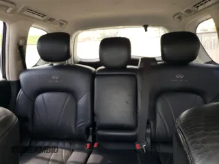 2012 Infiniti QX56 8-passenger z VIN JN8AZ2NC8C9315450, wystawiony jako Copart lot #55619485 z przebiegiem 254 525 mil mil oraz Czysty tytuł • Clean title. Historia ofert i sprzedaży dostępna na DreamBid. Obrazek 10.
