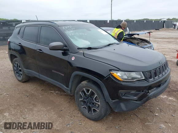 2019 Jeep Compass Trailhawk z VIN 3C4NJDDB5KT618149, wystawiony jako IAAI lot #41959320 z przebiegiem 99 795 mil mil oraz . Historia ofert i sprzedaży dostępna na DreamBid. Obrazek 1.