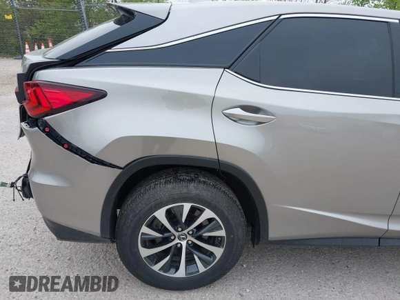 2022 Lexus RX 350 with VIN 2T2AZMDA7NC352957, listed as a IAAI auction lot 42297457 with 34,576 mi miles and . Bid and sale history available at DreamBid. Image 17.