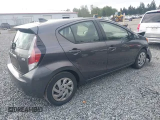 2015 Toyota Prius One z VIN JTDKDTB32F1575905, wystawiony jako IAAI lot #42152447 z przebiegiem 141 061 mil mil oraz . Historia ofert i sprzedaży dostępna na DreamBid. Obrazek 4.