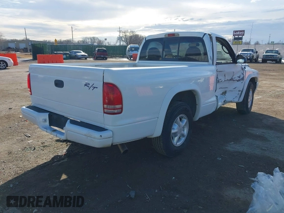 2000 Dodge Dakota SLT with VIN 1B7GL26Z7YS708253, listed as a IAAI auction lot 41402953 with 103,461 mi miles and . Bid and sale history available at DreamBid. Image 4.