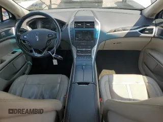 2016 Lincoln MKZ z VIN 3LN6L2J99GR620863, wystawiony jako Copart lot #59547725 z przebiegiem 121 607 mil mil oraz Szkoda całkowita • Salvage title. Historia ofert i sprzedaży dostępna na DreamBid. Obrazek 8.