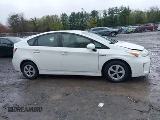 2012 Toyota Prius One with VIN JTDKN3DU1C5387772, listed as a IAAI auction lot 42176895 with 119,283 mi miles and . Bid and sale history available at DreamBid. Image 13.
