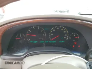 2002 Cadillac DeVille DHS z VIN 1G6KE57Y42U277428, wystawiony jako Copart lot #45757115 z przebiegiem 143 741 mil mil oraz Czysty tytuł • Clean title. Historia ofert i sprzedaży dostępna na DreamBid. Obrazek 9.