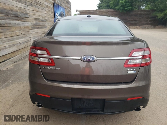 2016 Ford Taurus SEL with VIN 1FAHP2H86GG132160, listed as a Copart auction lot 61489735 with 135,437 mi miles and Clean title. Bid and sale history available at DreamBid. Image 6.