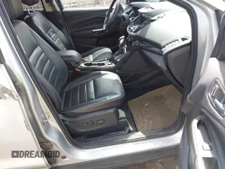 2016 Ford Escape Titanium with VIN 1FMCU9JX3GUA62802, listed as a IAAI auction lot 42001690 with 124,452 mi miles. Bid and sale history available at carsss.com. Image 5.