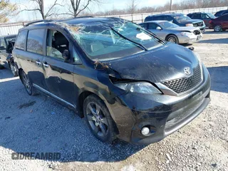 2014 Toyota Sienna SE with VIN 5TDXK3DC3ES521202, listed as a IAAI auction lot 41579320 with 182,982 mi miles. Bid and sale history available at carsss.com. Image 1.