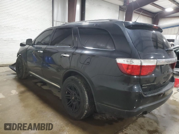 2013 Dodge Durango Crew with VIN 1C4SDJDT8DC509541, listed as a Copart auction lot 54063395 with 145,471 mi miles and Salvage title. Bid and sale history available at DreamBid. Image 2.