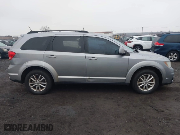 2016 Dodge Journey SXT with VIN 3C4PDDBG2GT242127, listed as a IAAI auction lot 41485555 with 119,728 mi miles. Bid and sale history available at carsss.com. Image 12.