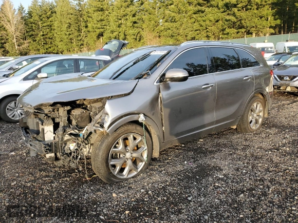 2016 Kia Sorento SXL z VIN 5XYPKDA16GG001293, wystawiony jako Copart lot #85128944 z przebiegiem 121 180 mil mil oraz Szkoda całkowita • Salvage title. Historia ofert i sprzedaży dostępna na DreamBid. Obrazek 1.