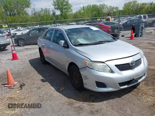 2009 Toyota Corolla with VIN 1NXBU40E49Z017630, listed as a IAAI auction lot 42204714 with 176,828 mi miles. Bid and sale history available at carsss.com. Image 1.