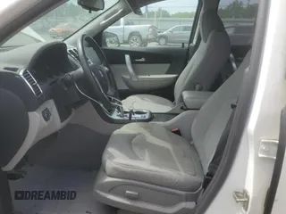 2010 GMC Acadia SL with VIN 1GKLRKED2AJ163582, listed as a Copart auction lot 54857135 with 72,161 mi miles and Salvage title. Bid and sale history available at DreamBid. Image 7.