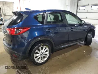 2015 Mazda CX-5 Grand Touring with VIN JM3KE4DY0F0493650, listed as a Copart auction lot 86371104 with 226,752 mi miles and Non Repairable. Bid and sale history available at DreamBid. Image 3.