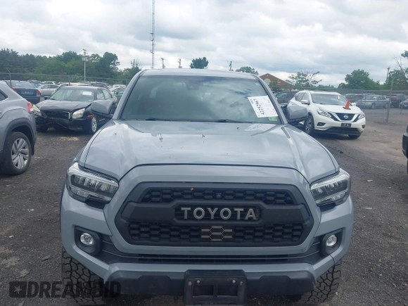 2021 Toyota Tacoma SR with VIN 5TFCZ5AN3MX258746, listed as a IAAI auction lot 42252967 with 62,095 mi miles and . Bid and sale history available at DreamBid. Image 12.