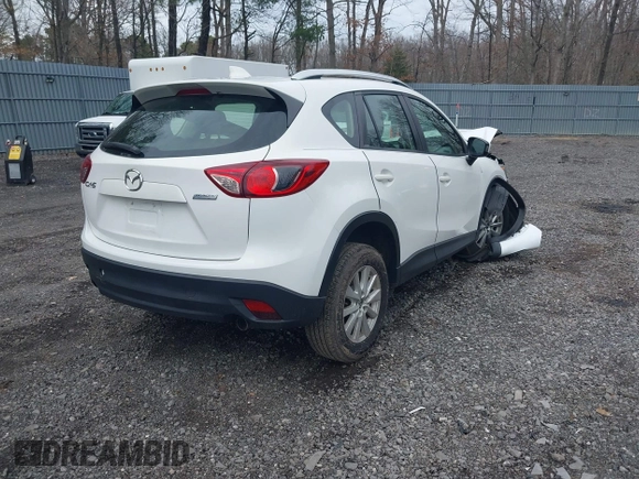 2014 Mazda CX-5 Sport with VIN JM3KE4BE3E0300849, listed as a IAAI auction lot 41942418 with 144,310 mi miles. Bid and sale history available at carsss.com. Image 4.