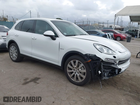 2014 Porsche Cayenne S Hybrid with VIN WP1AE2A28ELA51123, listed as a IAAI auction lot 42091475 with 41,341 mi miles and . Bid and sale history available at DreamBid. Image 1.