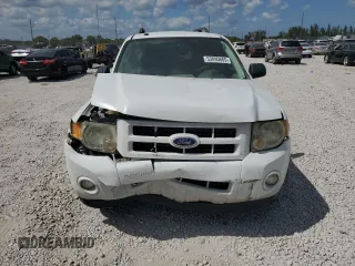 2011 Ford Escape Hybrid z VIN 1FMCU5K34BKB66370, wystawiony jako Copart lot #53090685 z przebiegiem 251 409 mil mil oraz Szkoda całkowita • Salvage title. Historia ofert i sprzedaży dostępna na DreamBid. Obrazek 5.