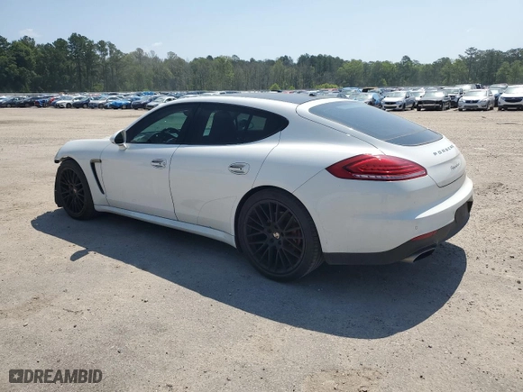 2016 Porsche Panamera 4 with VIN WP0AA2A79GL000127, listed as a Copart auction lot 56220614 with 76,065 mi miles and Salvage Title. Bid and sale history available at carsss.com. Image 2.