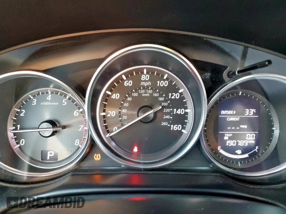 2014 Mazda CX-5 Touring with VIN JM3KE2CY5E0316077, listed as a Copart auction lot 58218735 with 190,789 mi miles and Salvage title. Bid and sale history available at DreamBid. Image 9.
