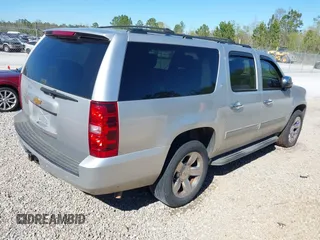 2014 Chevrolet Suburban LT with VIN 1GNSCJE06ER105294, listed as a IAAI auction lot 41687882 with 200,698 mi miles. Bid and sale history available at carsss.com. Image 4.