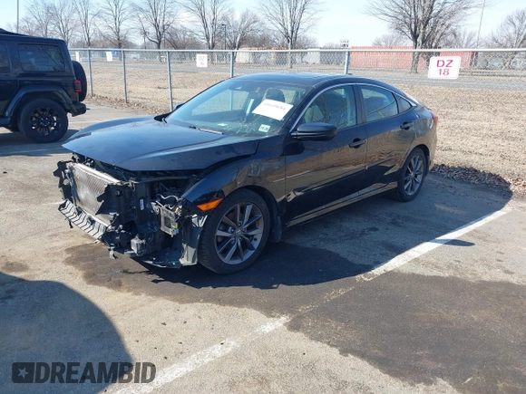 2021 Honda Civic Sedan EX with VIN 19XFC1F32ME206507, listed as a IAAI auction lot 41649684 with 145,491 mi miles. Bid and sale history available at carsss.com. Image 2.