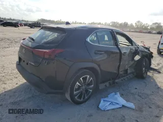 2024 Lexus UX with VIN JTHX6JBH9R2189737, listed as a Copart auction lot 77551214 with 0 mi miles and Salvage Title. Bid and sale history available at carsss.com. Image 3.