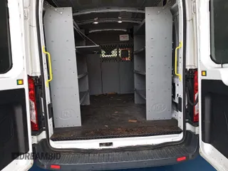 2018 Ford Transit with VIN 1FTYE1CM4JKB47646, listed as a IAAI auction lot 42728009 with 207,268 mi miles and . Bid and sale history available at DreamBid. Image 22.