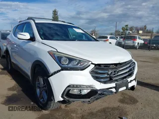 2017 Hyundai Santa Fe 2.4L z VIN 5XYZU3LB7HG438756, wystawiony jako IAAI lot #41480791 z przebiegiem 138 392 mil mil oraz . Historia ofert i sprzedaży dostępna na DreamBid. Obrazek 1.