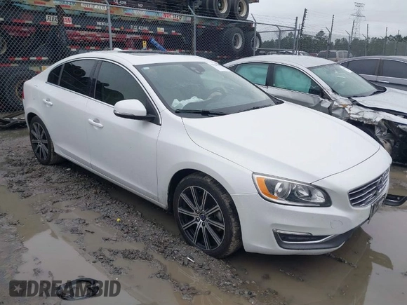 2017 Volvo S60 Inscription with VIN LYV402HKXHB148240, listed as a IAAI auction lot 41618292 with 77,870 mi miles. Bid and sale history available at carsss.com. Image 1.