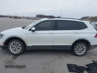 2020 Volkswagen Tiguan S with VIN 3VV1B7AX5LM079123, listed as a IAAI auction lot 41957273 with 89,449 mi miles and . Bid and sale history available at DreamBid. Image 14.