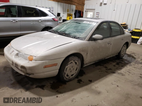 2000 Saturn SL with VIN 1G8ZK5273YZ239987, listed as a Copart auction lot 41577615 with 145,659 mi miles and Salvage title. Bid and sale history available at DreamBid. Image 1.