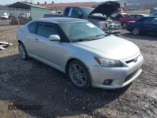 2012 Scion tC z VIN JTKJF5C73C3041811, wystawiony jako IAAI lot #41649126 z przebiegiem 188 685 mil mil oraz . Historia ofert i sprzedaży dostępna na DreamBid. Obrazek 1.