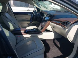 2017 Ford Fusion Energi Titanium with VIN 3FA6P0SU5HR105477, listed as a IAAI auction lot 41072696 with 92,926 mi miles. Bid and sale history available at carsss.com. Image 5.