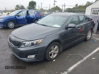 2015 Kia Optima LX z VIN KNAGM4A73F5624101, wystawiony jako IAAI lot #40746046 z przebiegiem 166 468 mil mil oraz . Historia ofert i sprzedaży dostępna na DreamBid. Obrazek 2.