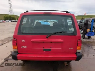 1999 Jeep Cherokee Sport with VIN 1J4FF68S2XL648735, listed as a Copart auction lot 58758115 with 252,248 mi miles and Salvage title. Bid and sale history available at DreamBid. Image 6.
