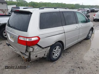 2005 Honda Odyssey EX-L with VIN 5FNRL38685B055538, listed as a IAAI auction lot 42183078 with 277,597 mi miles and . Bid and sale history available at carsss.com. Image 4.