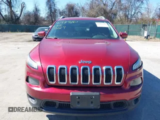 2015 Jeep Cherokee Latitude with VIN 1C4PJMCB6FW714656, listed as a IAAI auction lot 41887261 with 131,600 mi miles and . Bid and sale history available at carsss.com. Image 12.