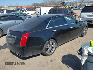 2014 Cadillac CTS Vsport Premium RWD z VIN 1G6AV5S81E0159352, wystawiony jako IAAI lot #41889600 z przebiegiem 94 859 mil mil oraz . Historia ofert i sprzedaży dostępna na DreamBid. Obrazek 4.