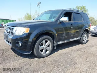 2009 Ford Escape Limited with VIN 1FMCU94G09KC03481, listed as a IAAI auction lot 42126118 with 167,446 mi miles. Bid and sale history available at carsss.com. Image 2.