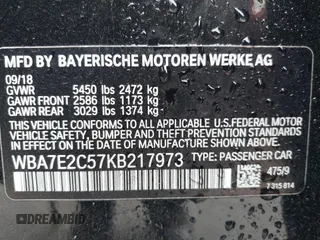 2019 BMW 7 Series 740i with VIN WBA7E2C57KB217973, listed as a IAAI auction lot 39064321 with 54,818 mi miles and . Bid and sale history available at DreamBid. Image 9.